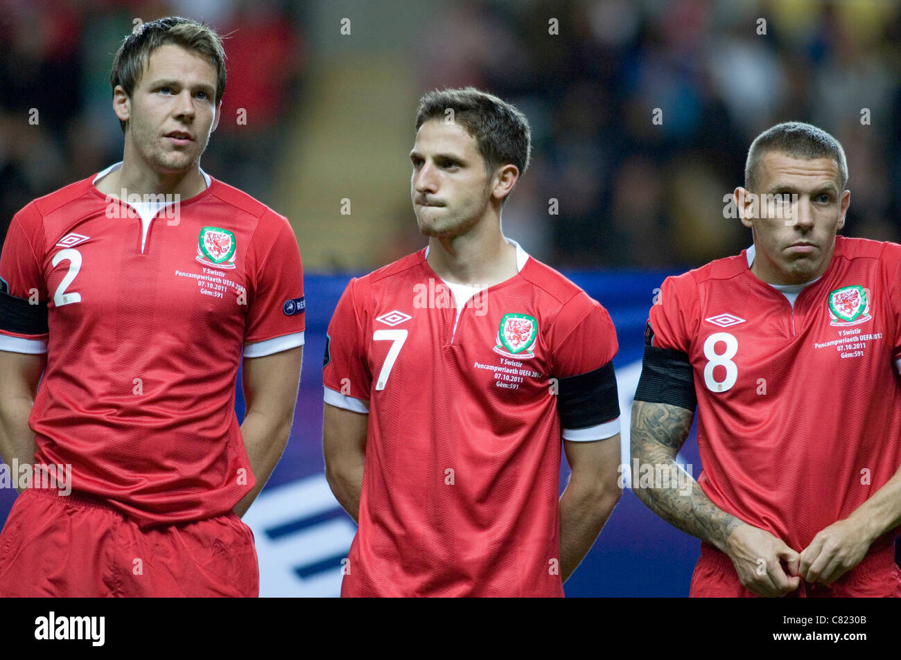 Il Galles v svizzera - Euro 2012 partita di qualificazione @ il Liberty Stadium di Swansea.galles i giocatori da sinistra a destra : Chris Gunter, Joe Allen e Craig Bellamy. Foto Stock