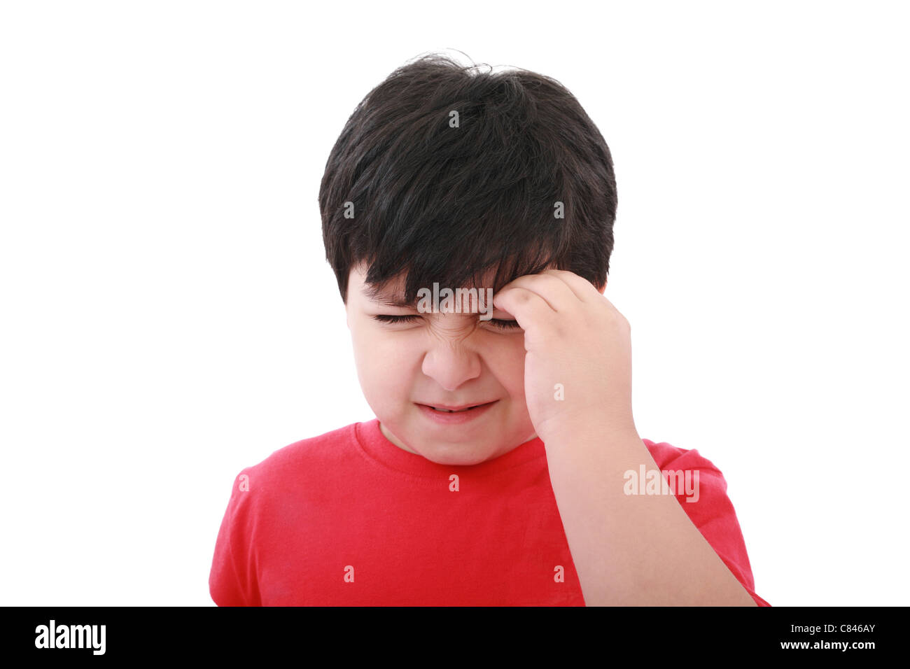 Un ragazzo con un mal di testa; isolati su sfondo bianco Foto Stock