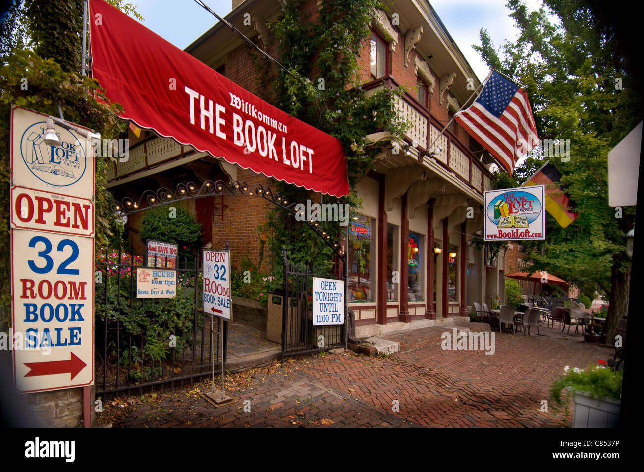 Il Libro loft, una famosa città-block long bookstore, nel villaggio tedesco sezione di Columbus Ohio. Foto Stock