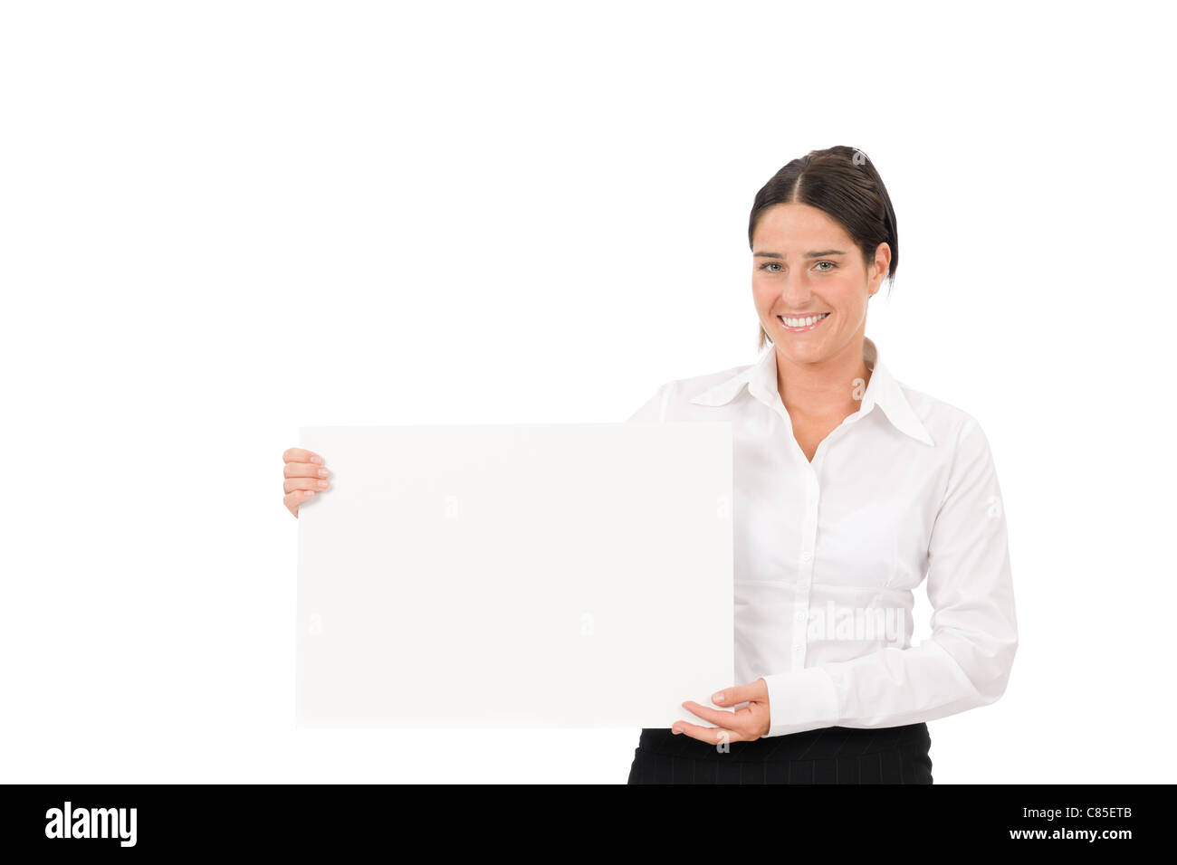 Felice imprenditrice tenere da parte vuoto banner pubblicitari su bianco Foto Stock