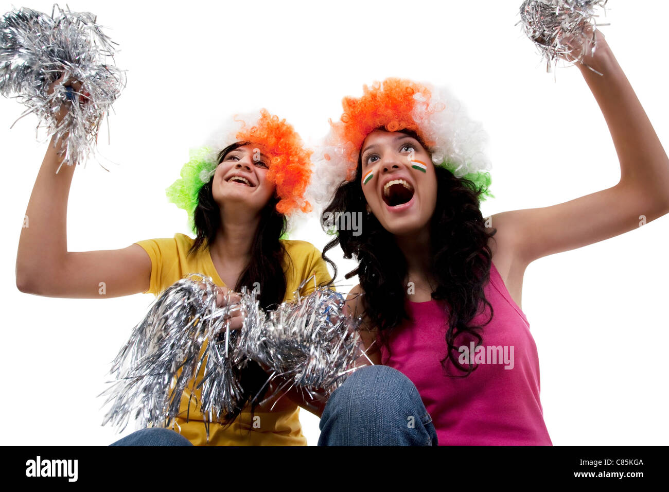 Ragazze con le parrucche tifo Foto Stock