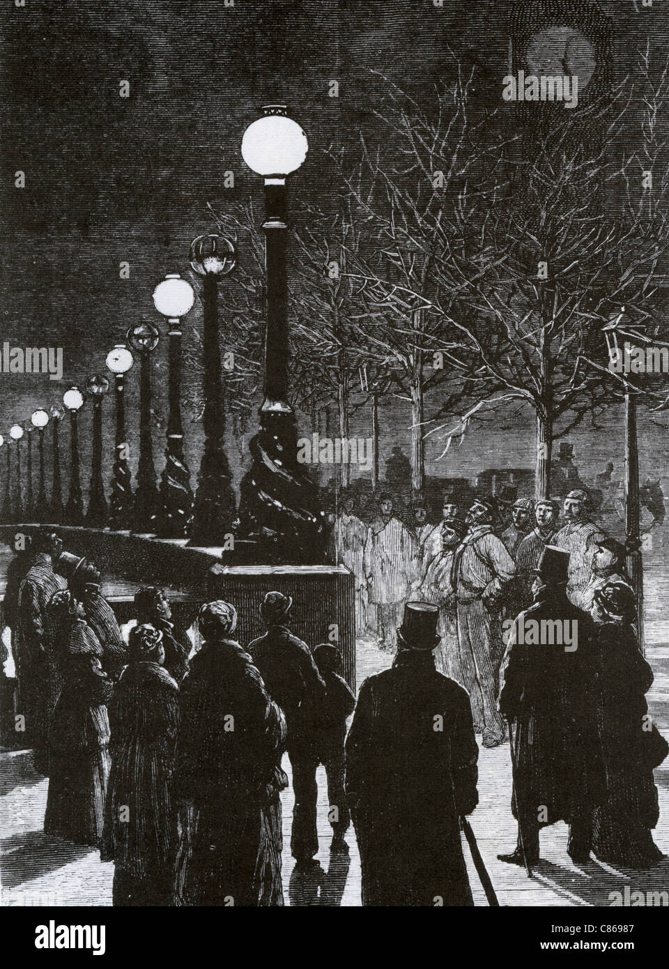 Il Tamigi Embankment è illuminato da energia elettrica per la prima volta nel 1879 Foto Stock