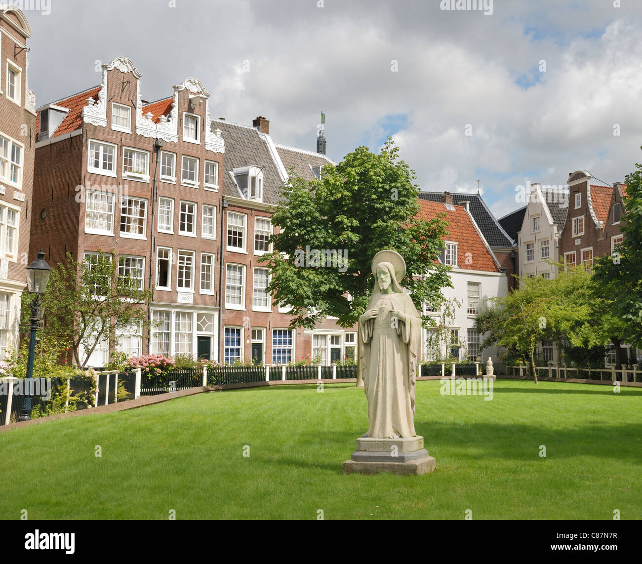 Religiosi scultura di strada nella zona residenziale di Amsterdam, Olanda. Foto Stock