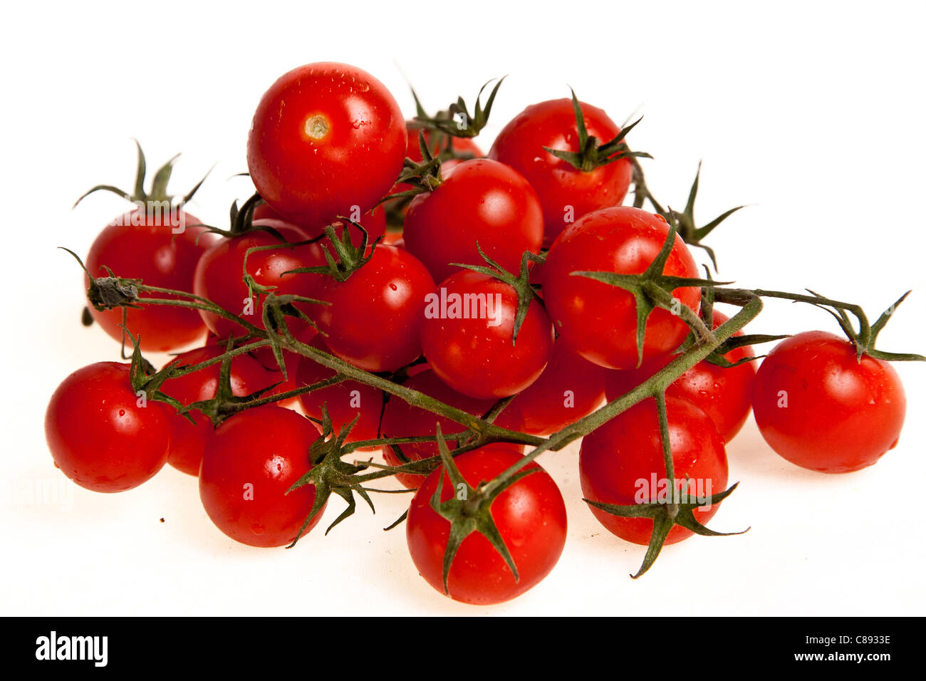 Pomodori biologico isolato su sfondo bianco Foto Stock