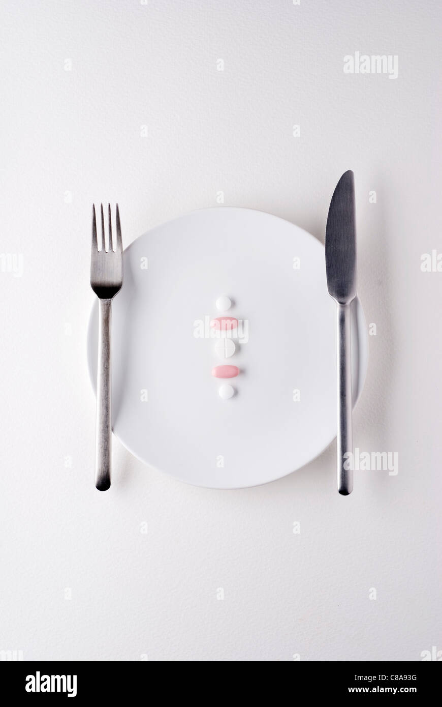 Pasto delle pillole Foto Stock