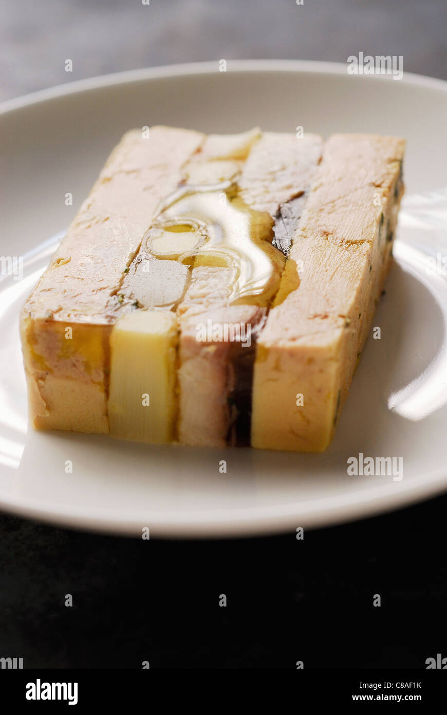 Il Foie gras,l'anguilla e terrina di asparagi Foto Stock