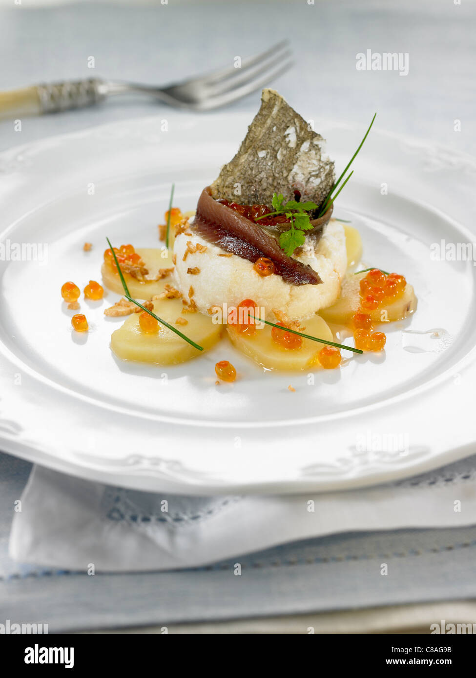 Sale-cod brandade con uova di salmone Foto Stock