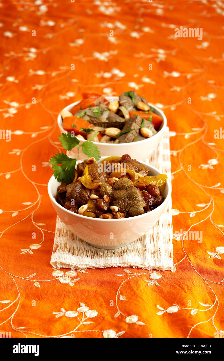 Agnello e zucca,Tajine di montone e uva passa Tajine Foto Stock