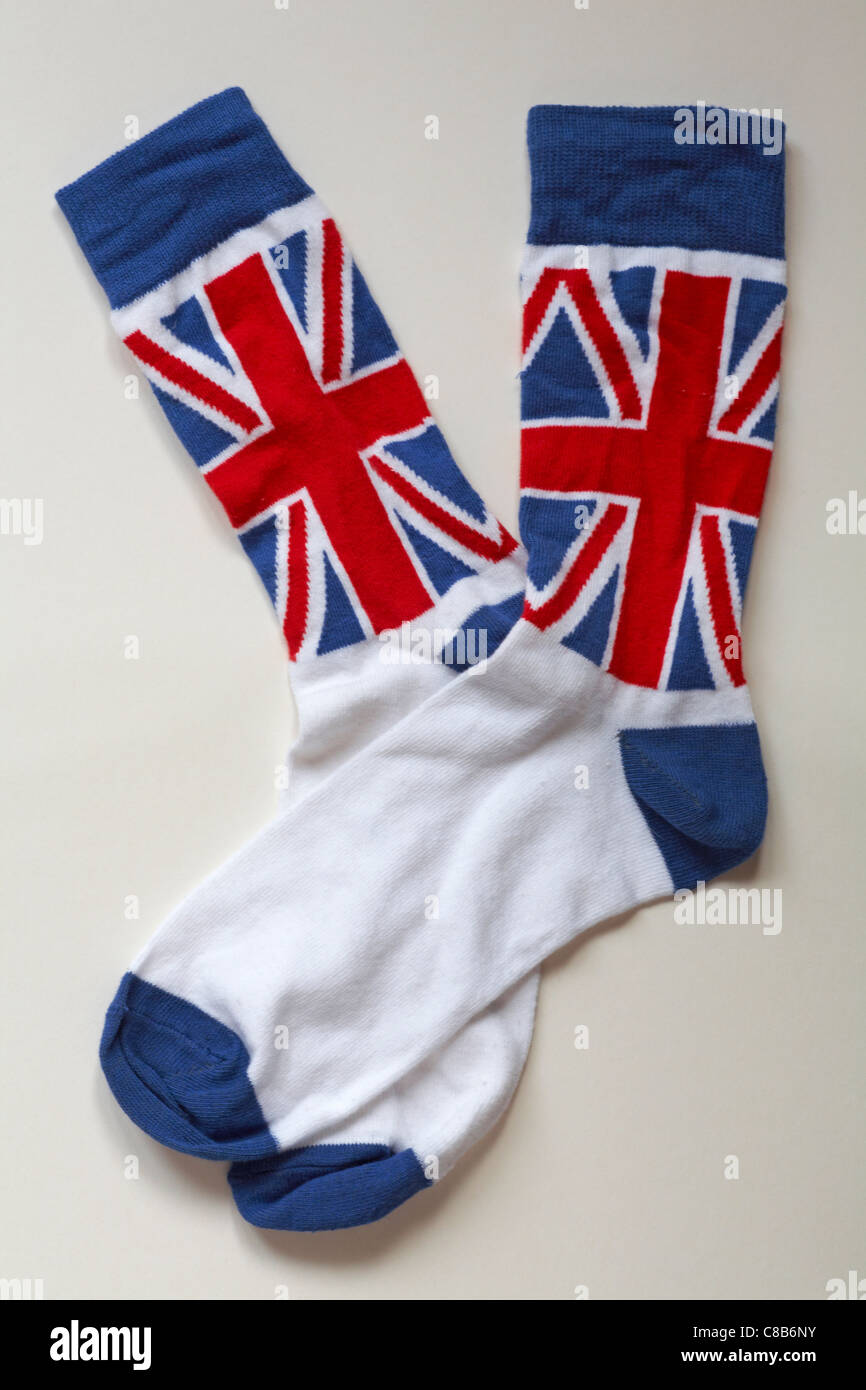 Coppia di novità calzini con Union Jack isolati su sfondo bianco Foto Stock