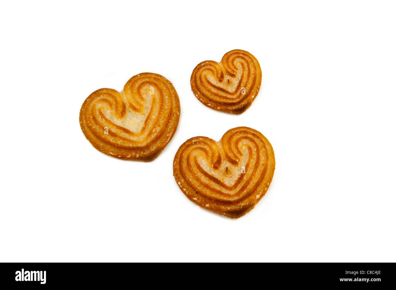 Tre a forma di cuore biscotti Foto Stock