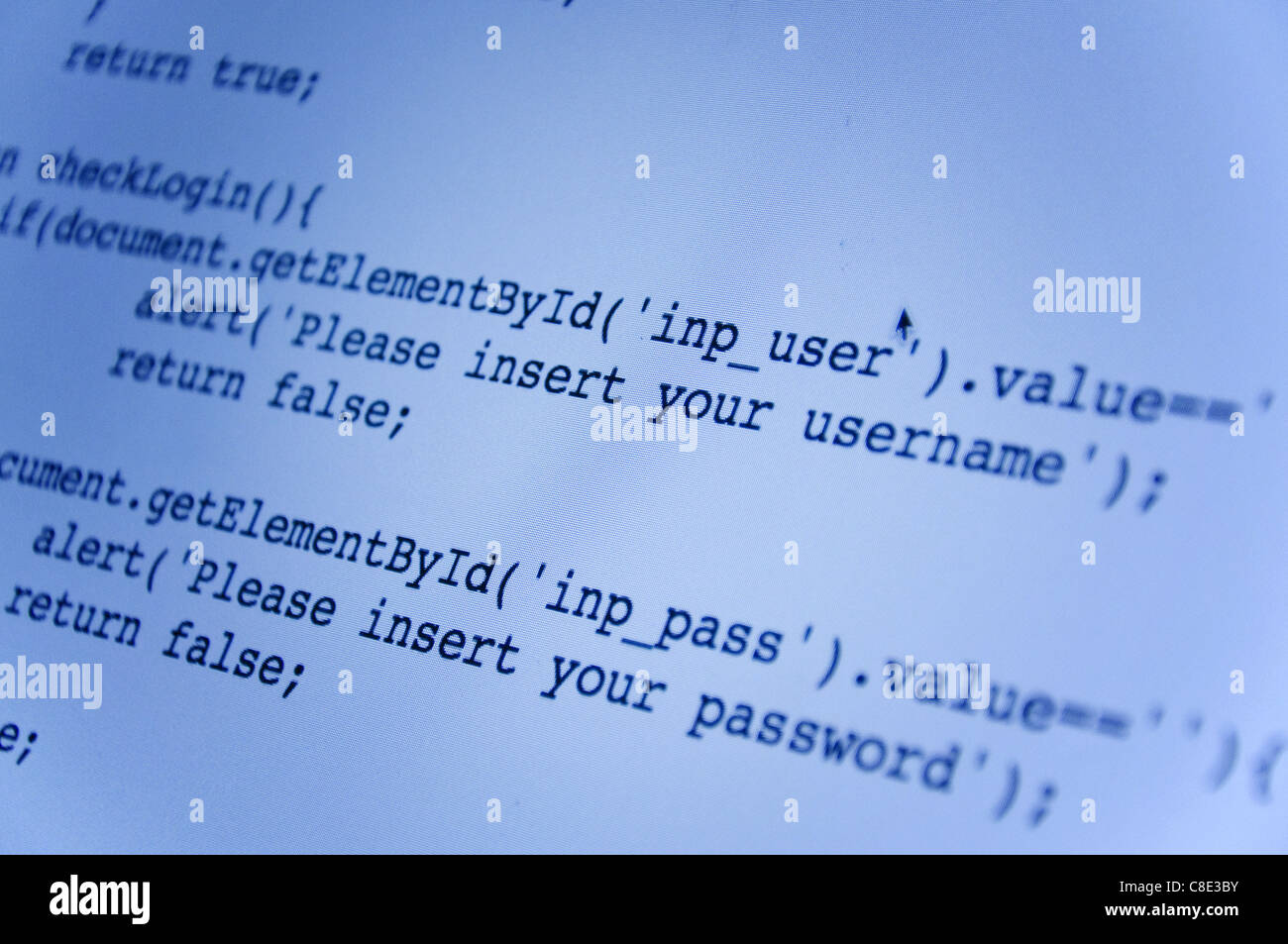Concetto di Internet: macro shot di uno schermo di un computer con poche righe di script java codice. Foto Stock