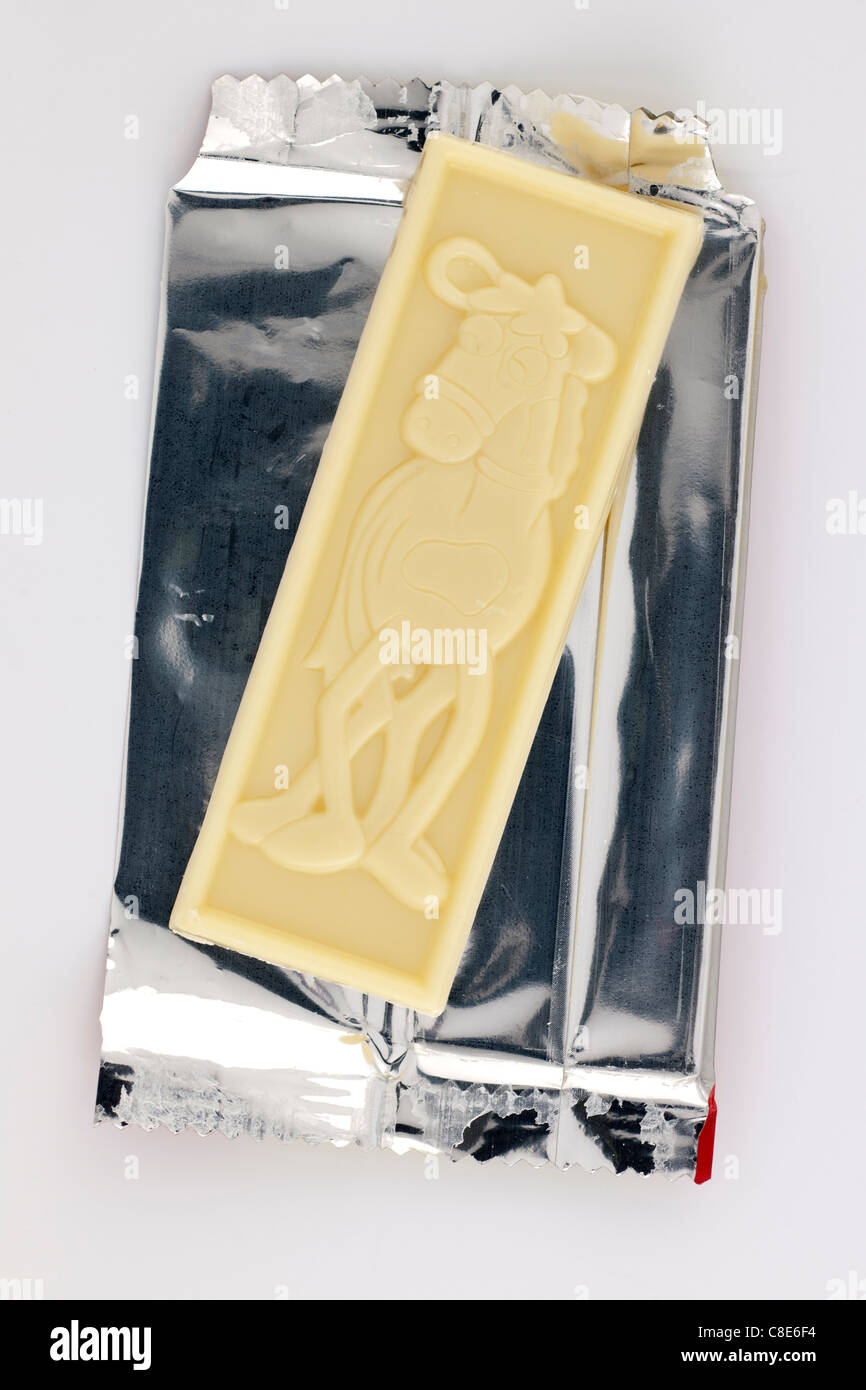 Piccolo bar di Nestlé Milky Bar cioccolato bianco con un personaggio a cavallo Foto Stock