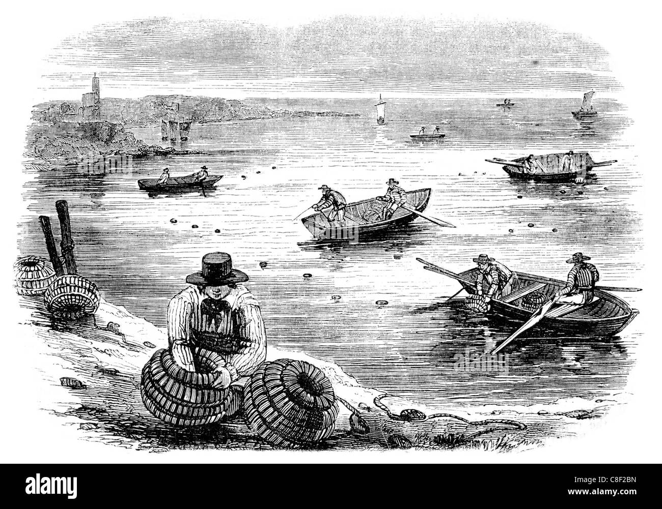 Attività di pesca del granchio pescatore esaminando classificazione cantra di cattura cantre crab vasi trappola lobster pot netting net esche boa chum Foto Stock