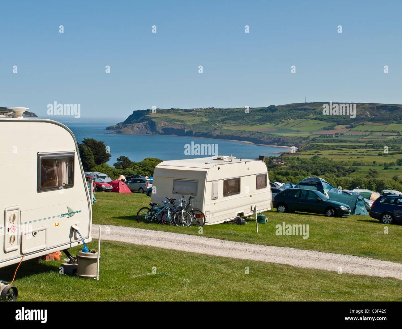 Caravan e campeggio a ganci fattoria a Robin cappe Bay Yorkshire Regno Unito Foto Stock