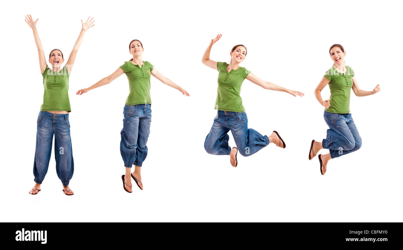 Bella donna felice saltando su uno sfondo bianco Foto Stock
