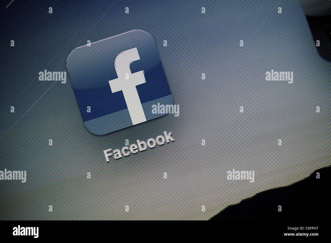 Macro shot del logo di Facebook sullo schermo di Ipad Apple2. Facebook è il più grande e il più usato social network. Foto Stock