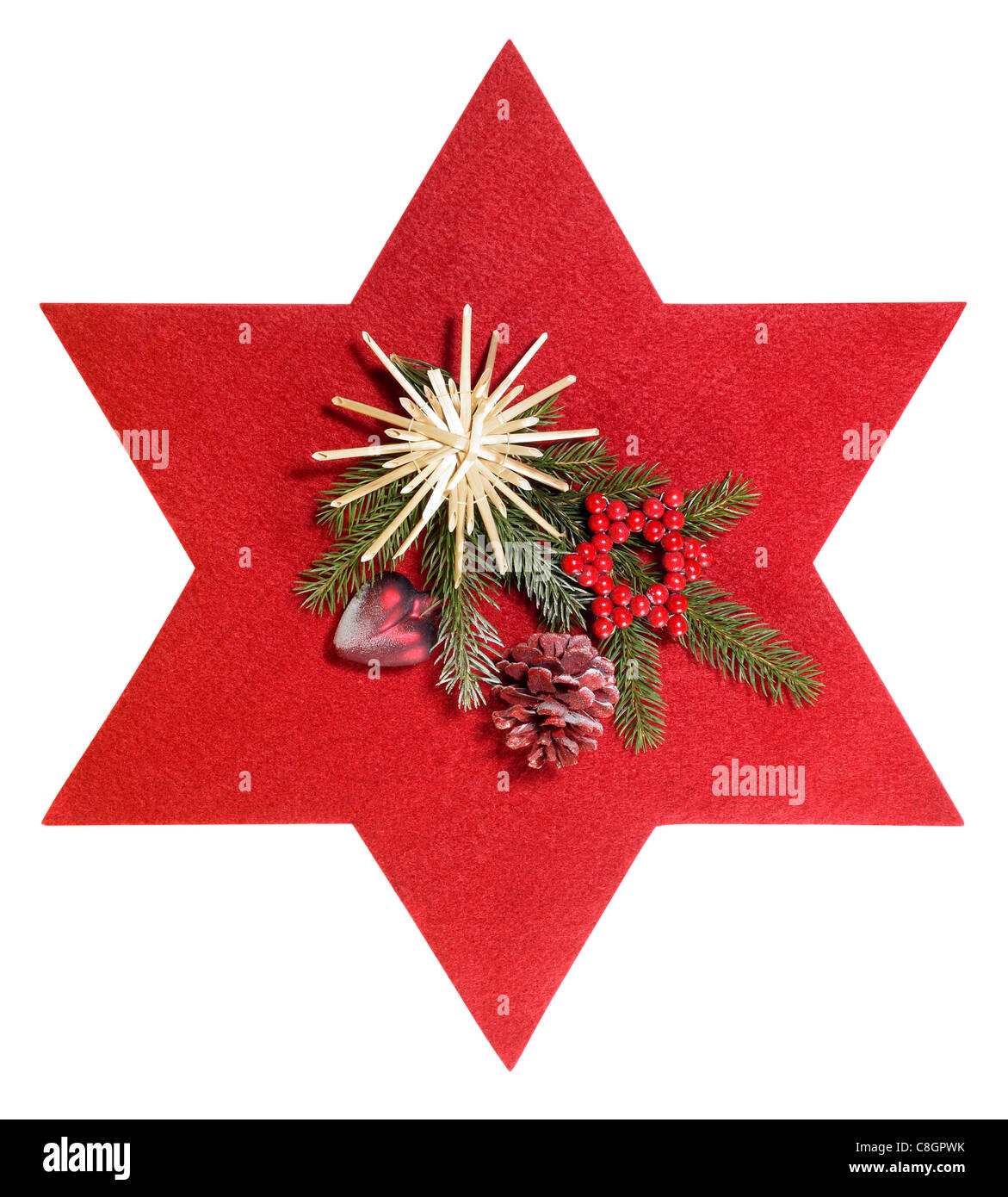 Scatto frontale di alcune decorazioni natalizie con feltro rosso star, isolato su bianco con tracciato di ritaglio Foto Stock
