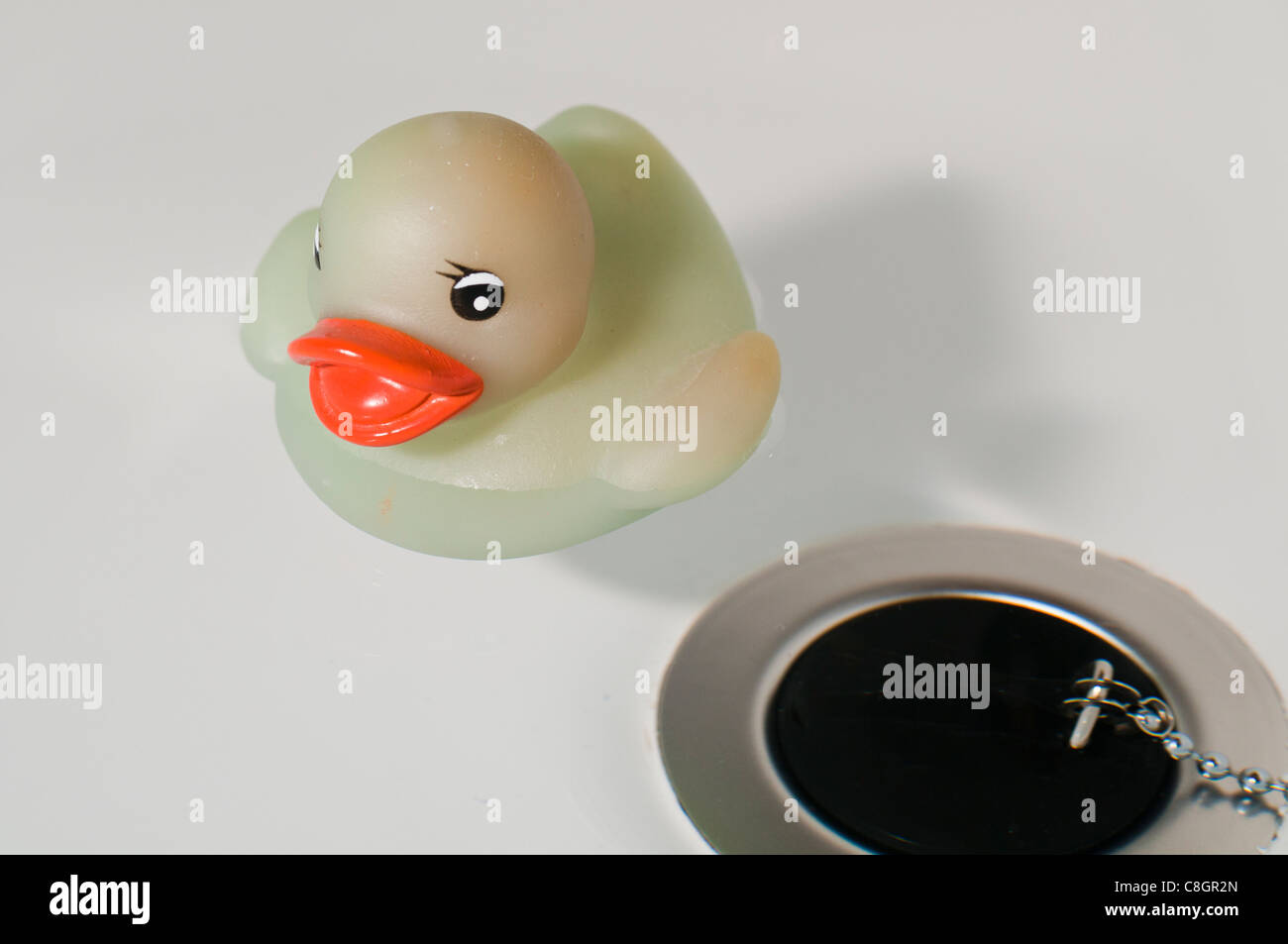 Rubber Duck & il foro del tappo Foto Stock