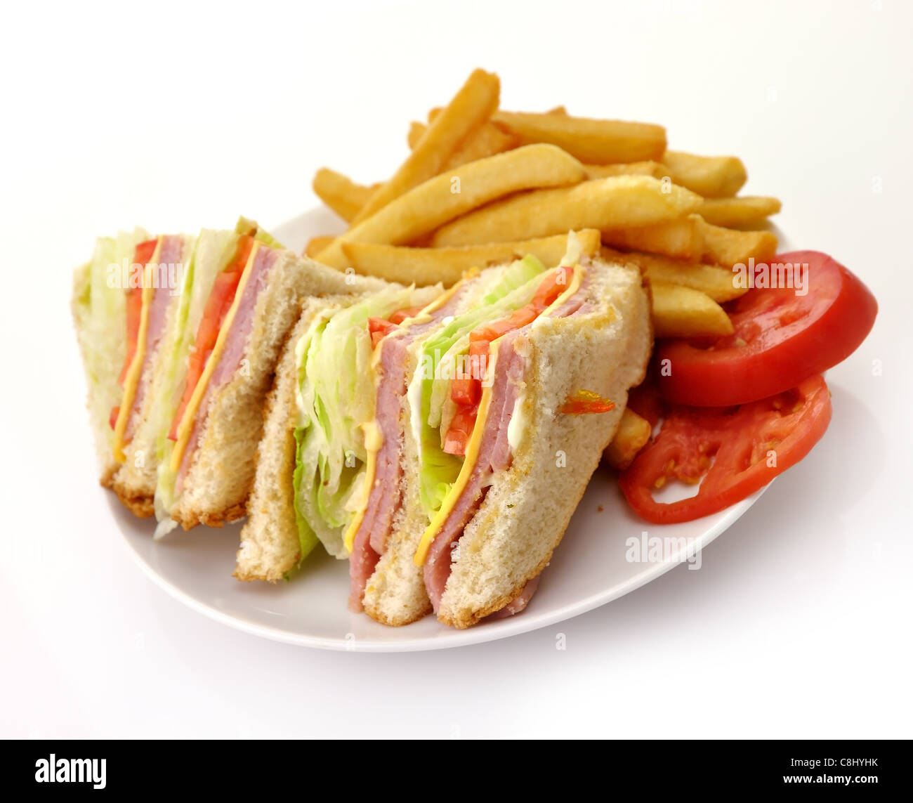 La Turchia o prosciutto Club Sandwich e patatine fritte Foto Stock