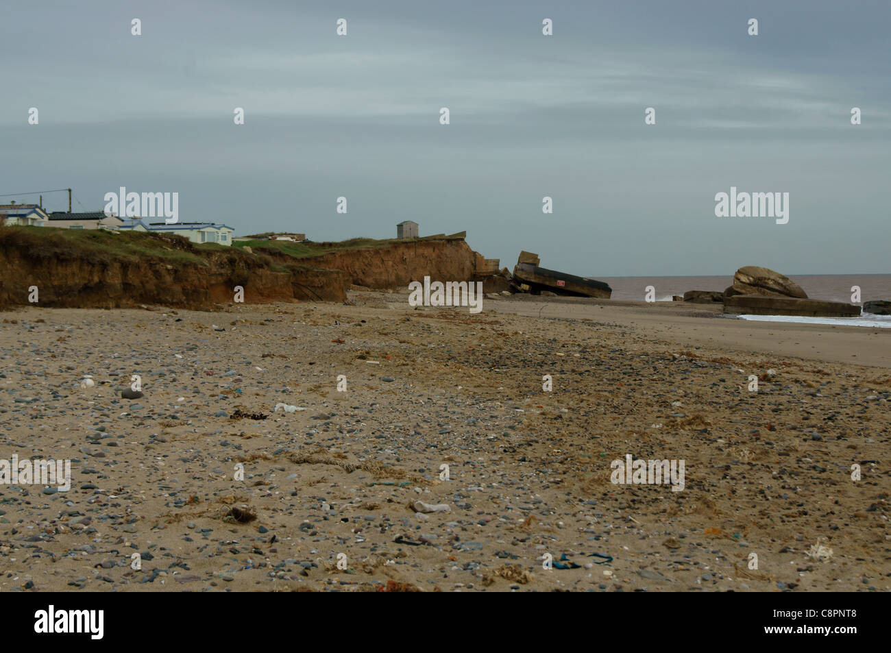 Erosione costiera sulla costa orientale dello Yorkshire vicino al punto di disprezzare Foto Stock