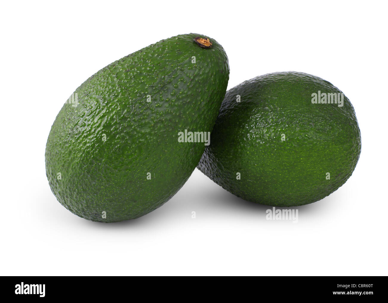 Due avocado isolati su sfondo bianco Foto Stock