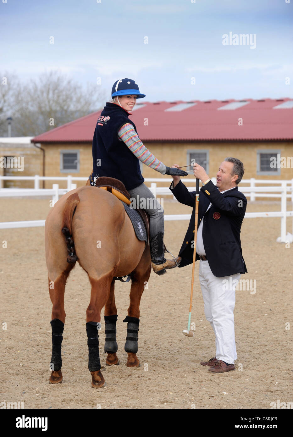 Imparare a giocare a polo con Mike Hobday, presidente di università Polo UK Foto Stock