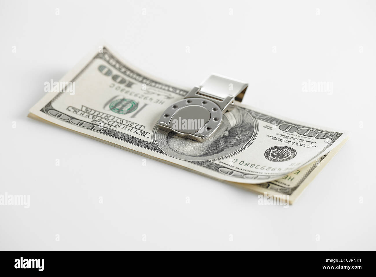 American cento-fatture del dollaro nella clip di denaro Foto Stock
