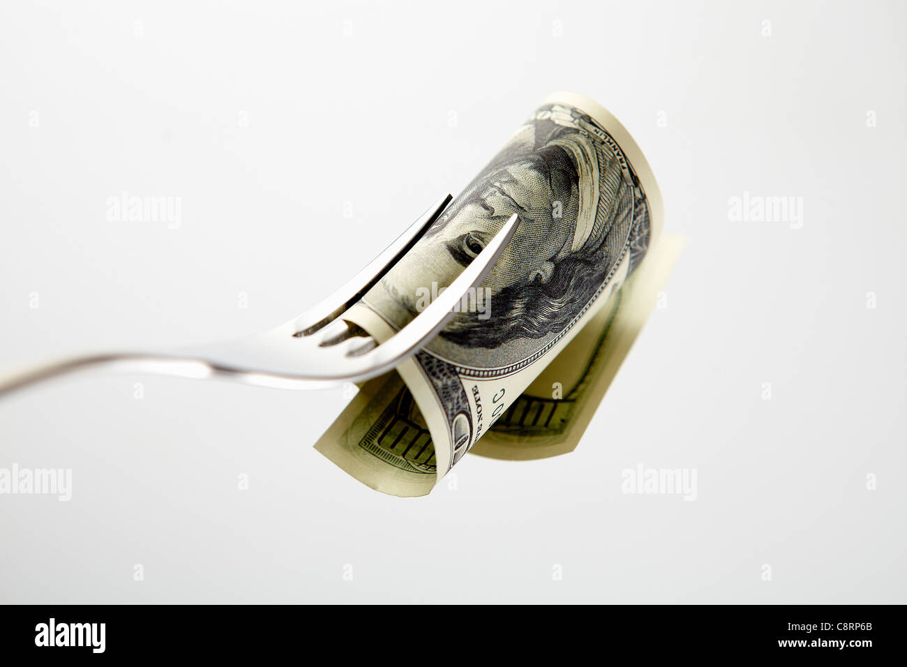 Laminati dollaro americano Bill sulla forcella Foto Stock