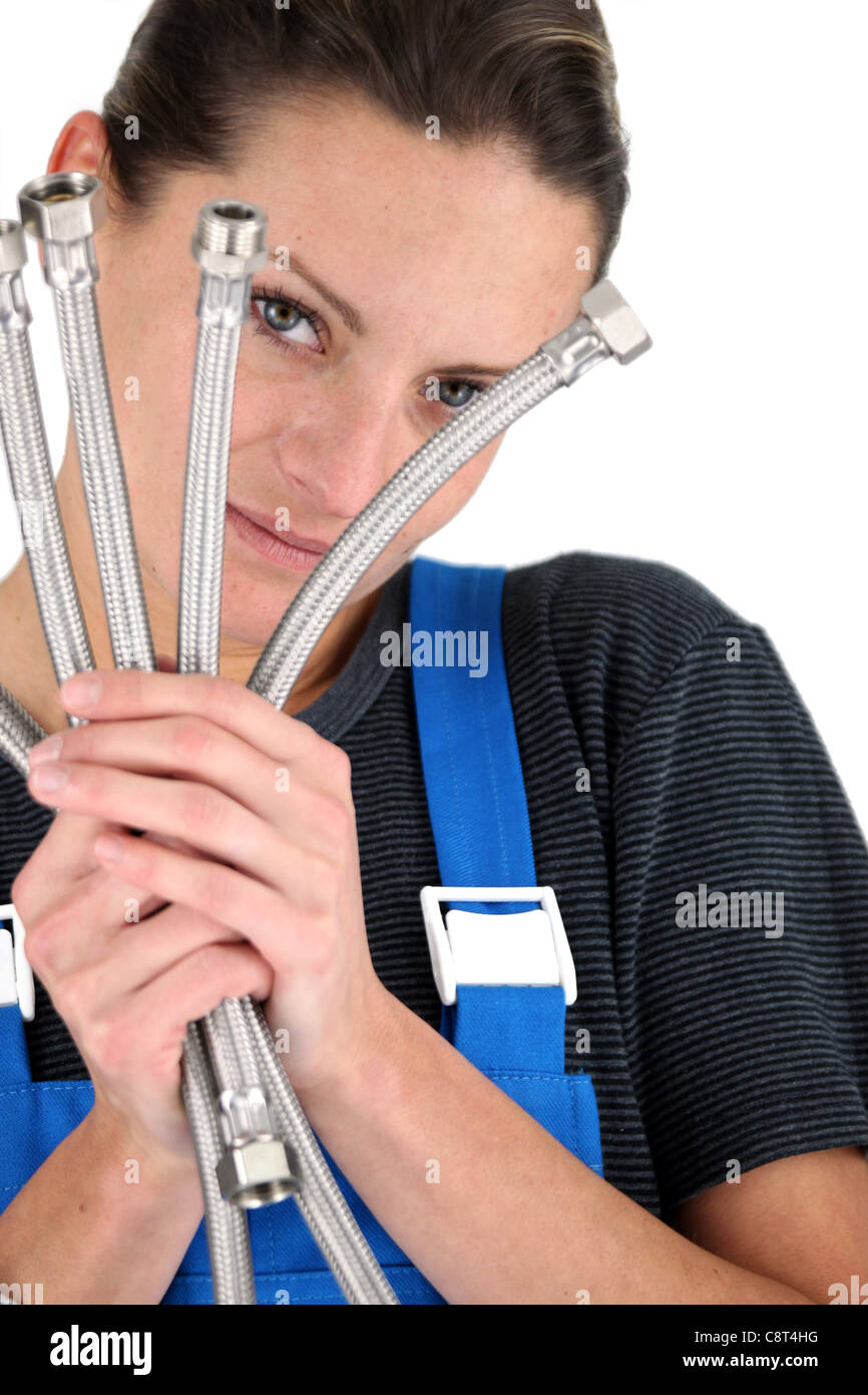 Idraulico femmina con tubi flessibili Foto Stock