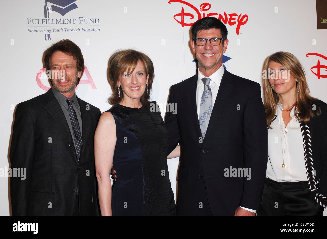 Jerry Bruckheimer, Anne Sweeney, ricco Ross, Stacey Snider presso gli arrivi di adempimento Fund Stars 2011 beneficiano di gala, il Beverly Hilton Hotel di Los Angeles, CA 1 novembre 2011. Foto di: Elizabeth Goodenough/Everett Collection Foto Stock