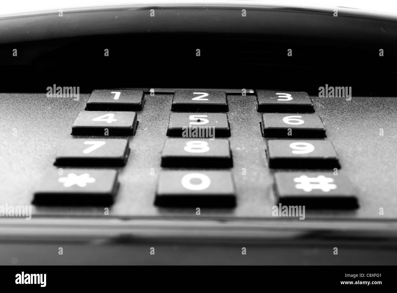 Uno nero telefono isolato Foto Stock