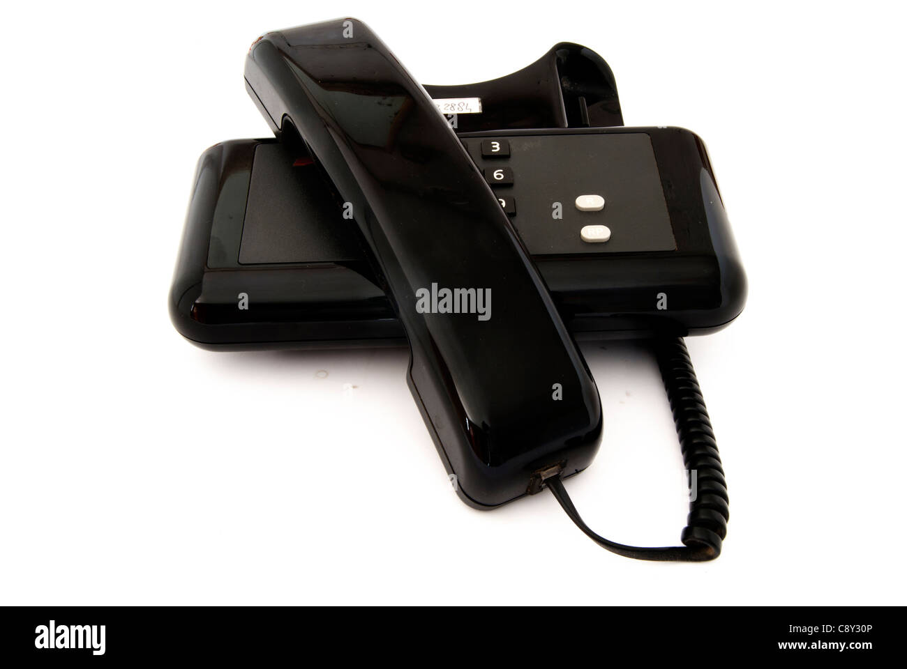 Uno nero telefono isolato Foto Stock