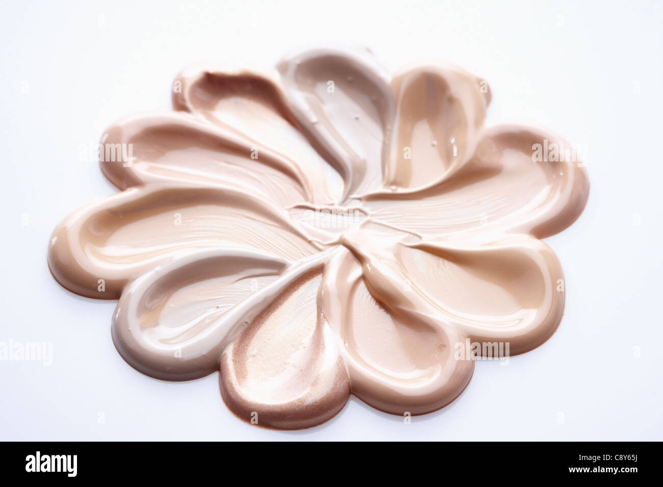 Forma di fiore della fondazione di liquido Foto Stock