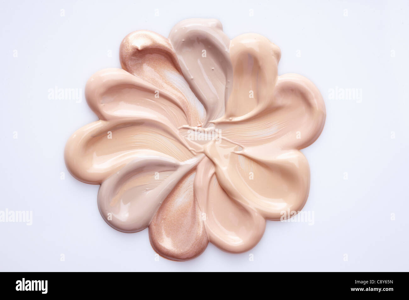 Forma di fiore della fondazione di liquido Foto Stock