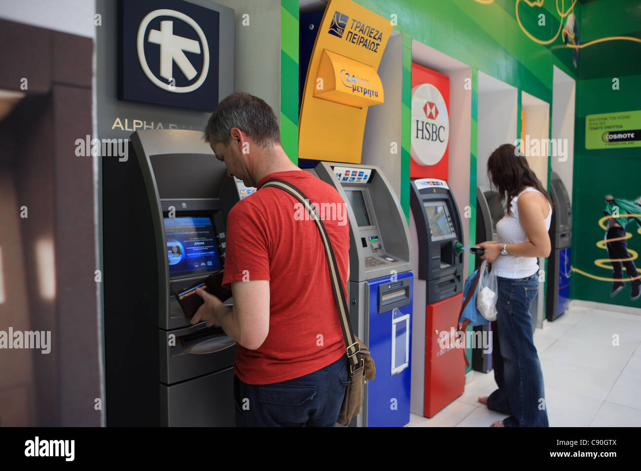 ATM ad Atene in Grecia Foto Stock