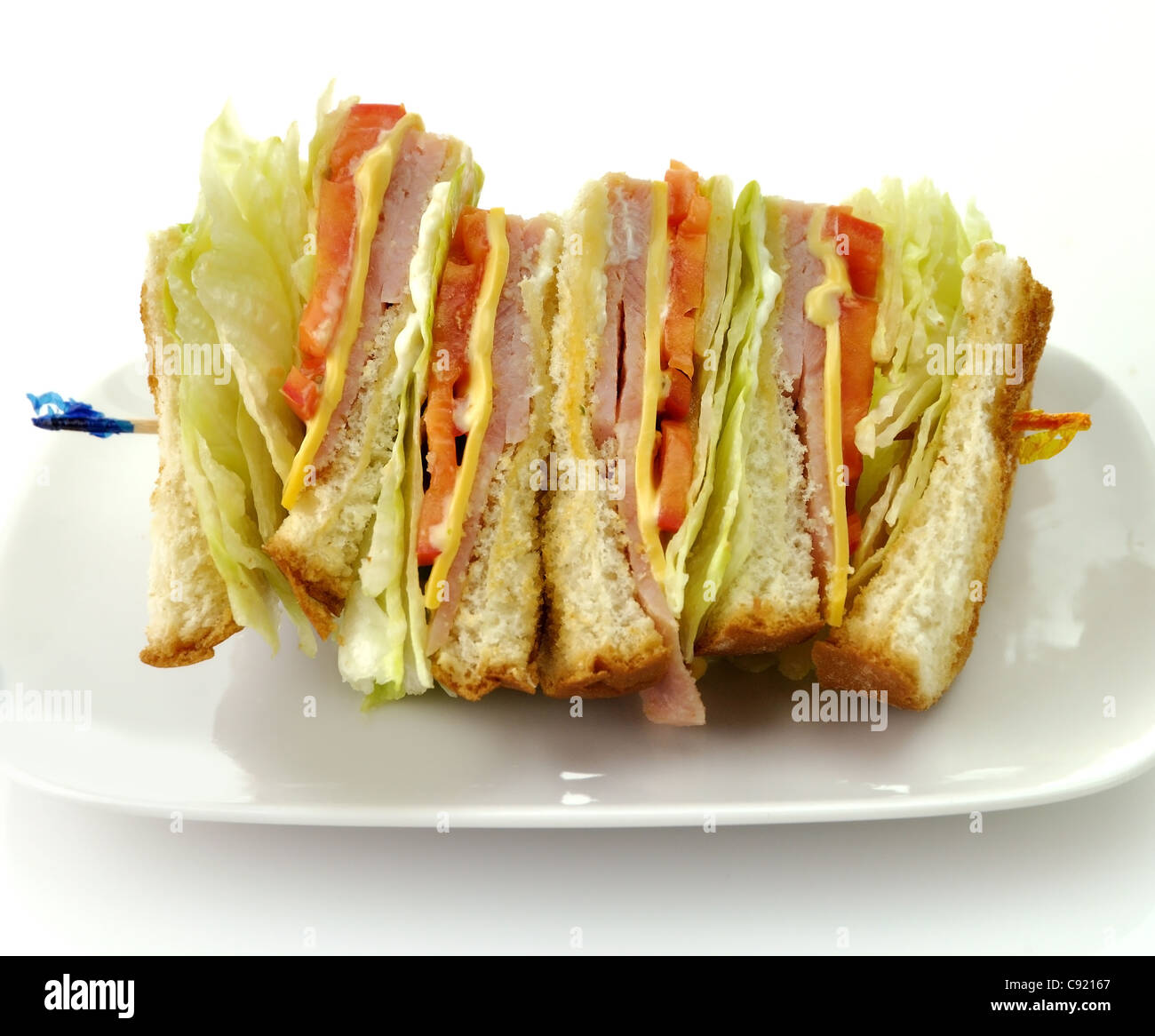 La Turchia o prosciutto Club Sandwich in un piatto bianco Foto Stock