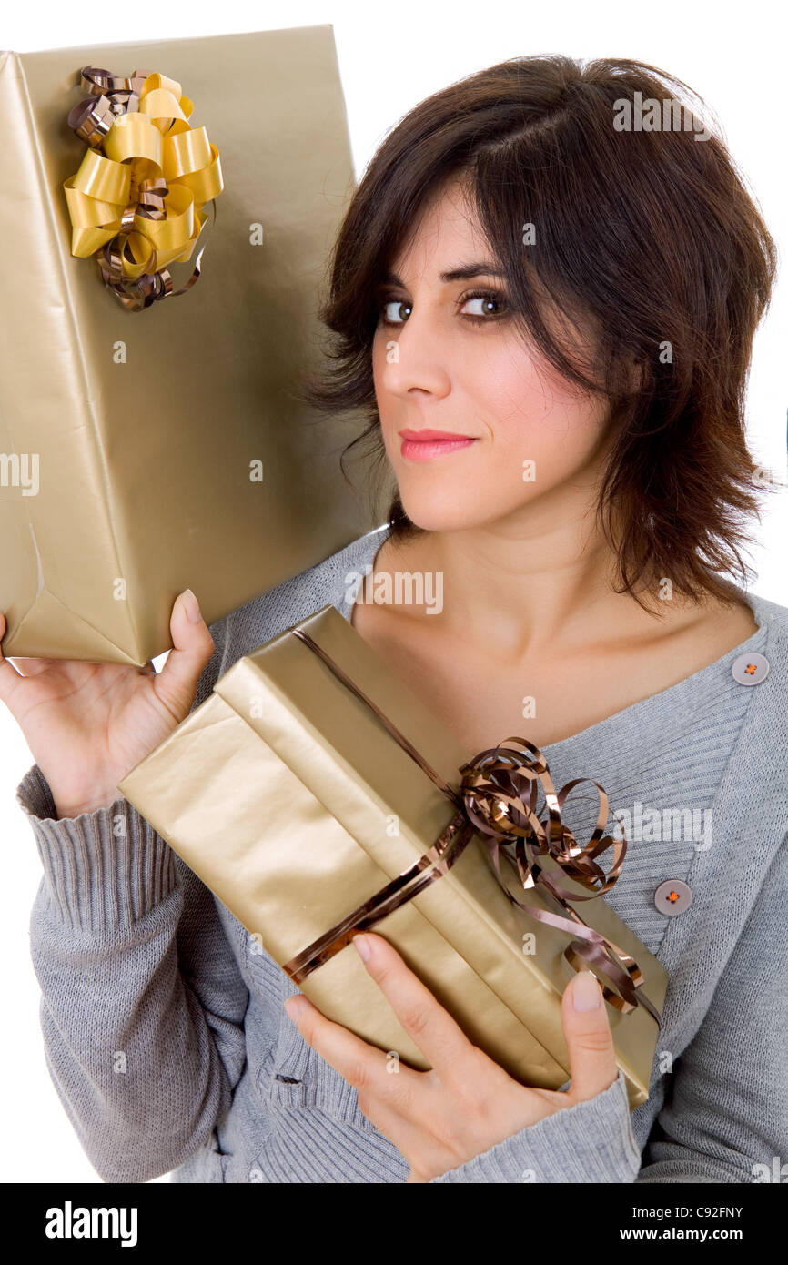 Shopping giovane donna con un sacco di regali, su bianco Foto Stock