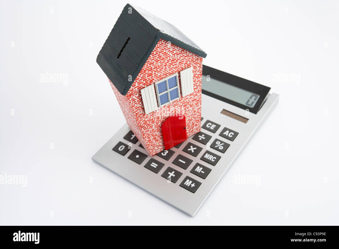 Modello di casa e calcolatrice Foto Stock