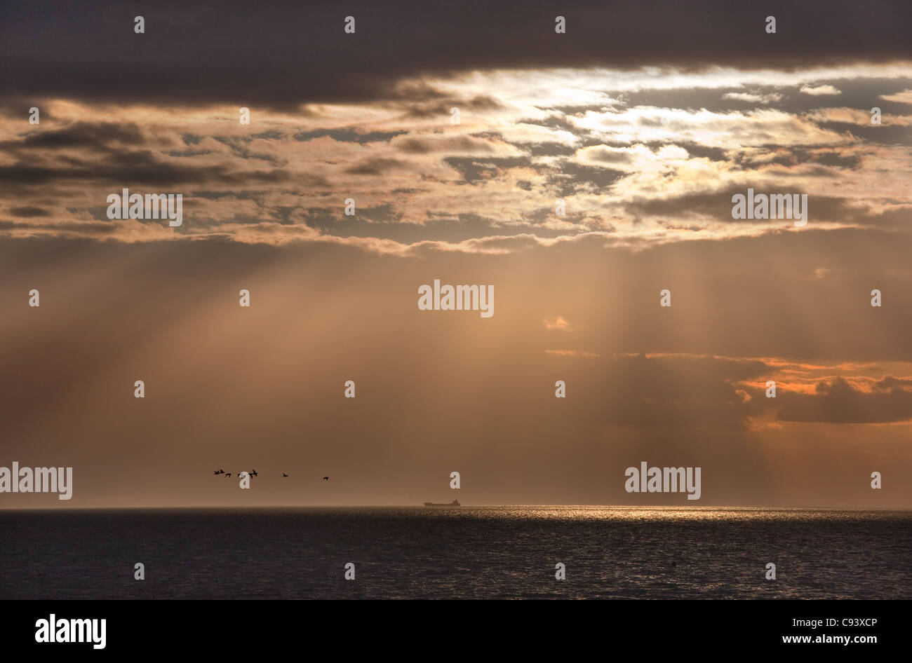 Il sole tramontare sull'Lavare Hunstanton Norfolk Foto Stock