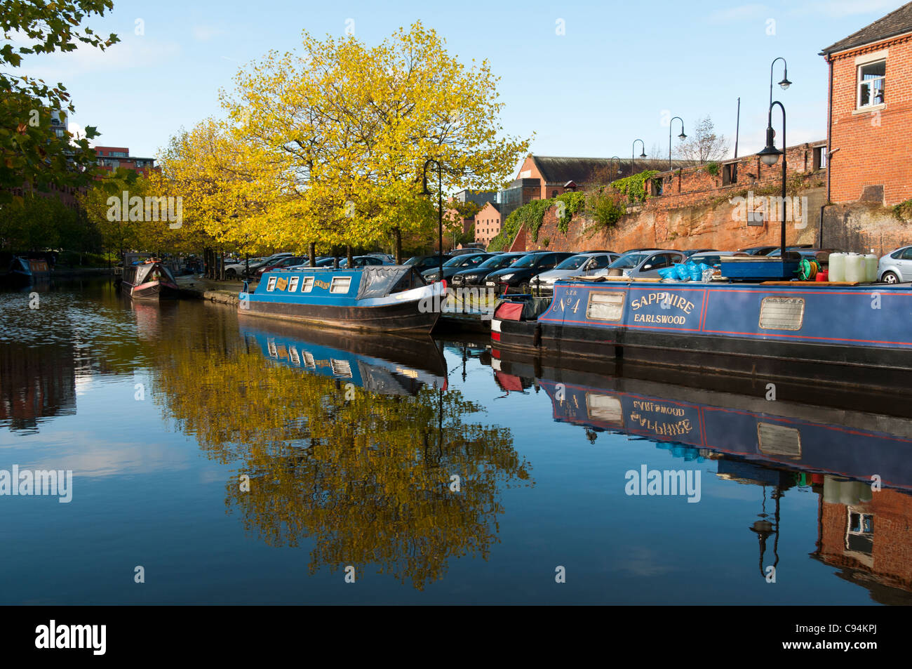 Narrowboats su Bridgewater Canal a Castlefield bacino, Manchester, Inghilterra, Regno Unito. Foto Stock
