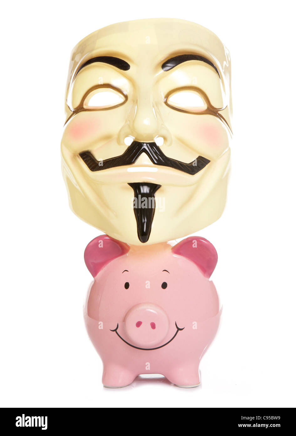 Piggybank e Guy Fawkes studio maschera di ritaglio Foto Stock