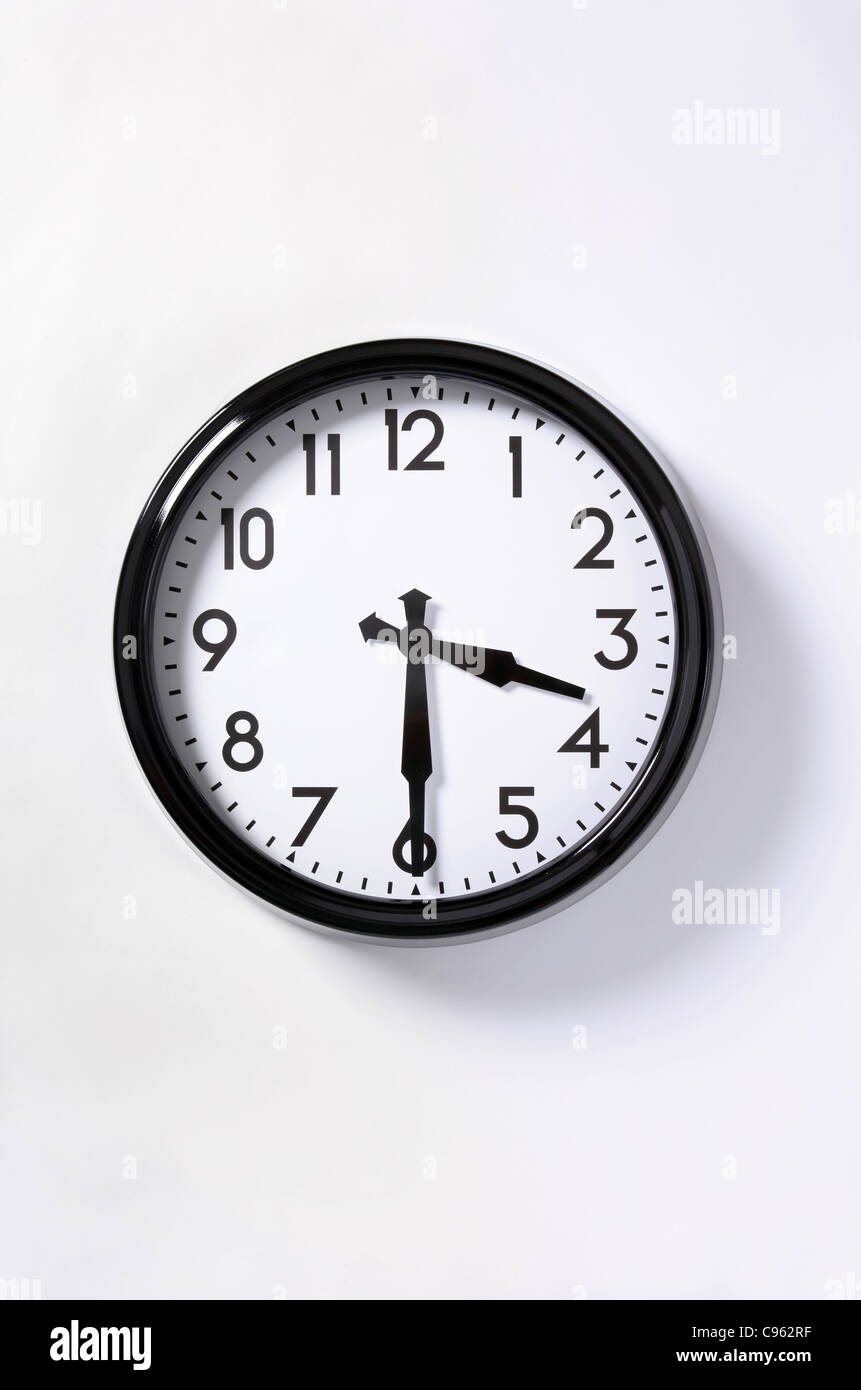 Un orologio con il tempo a 3.30 Foto Stock