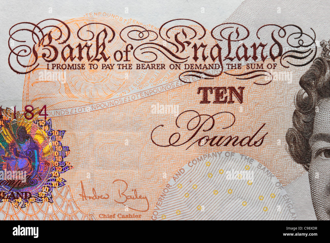 £10 Nota Close Up che mostra le parole 'prometto di pagare il portatore on demand la somma di dieci libbre' firmato da Andrew Bailey Foto Stock