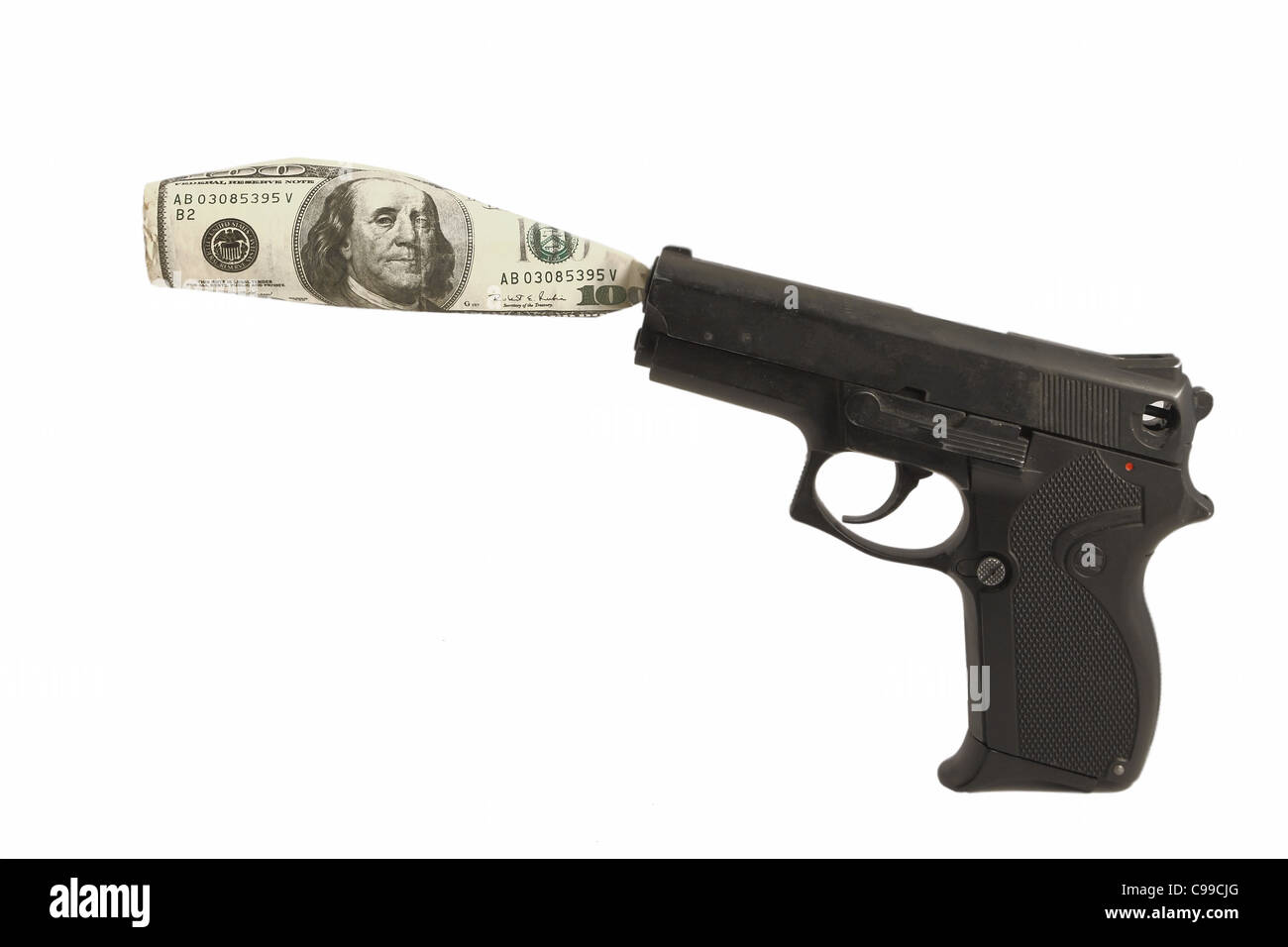 pistola e soldi Foto Stock