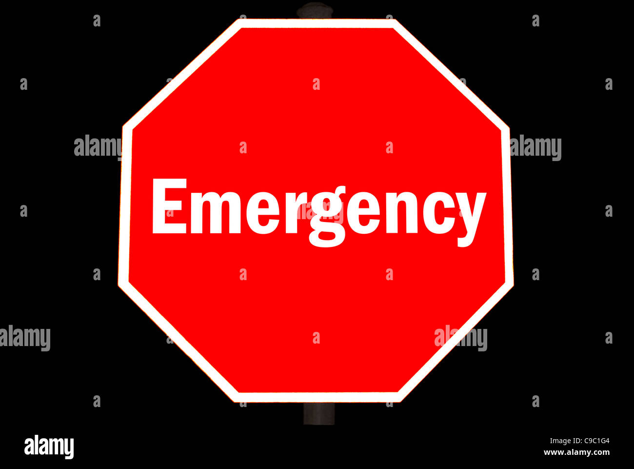 Il concetto di emergenza su un segno di stop rosso Foto Stock