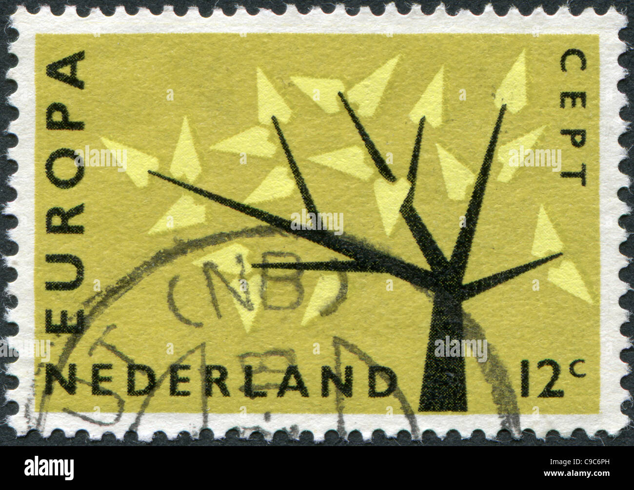 Paesi Bassi - 1962 CIRCA: un timbro stampato nei Paesi Bassi, mostra un albero stilizzato con 19 lascia, 1962 circa Foto Stock