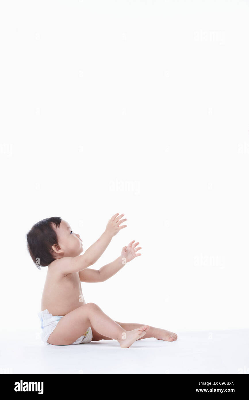 Baby boy nel pannolino Foto Stock