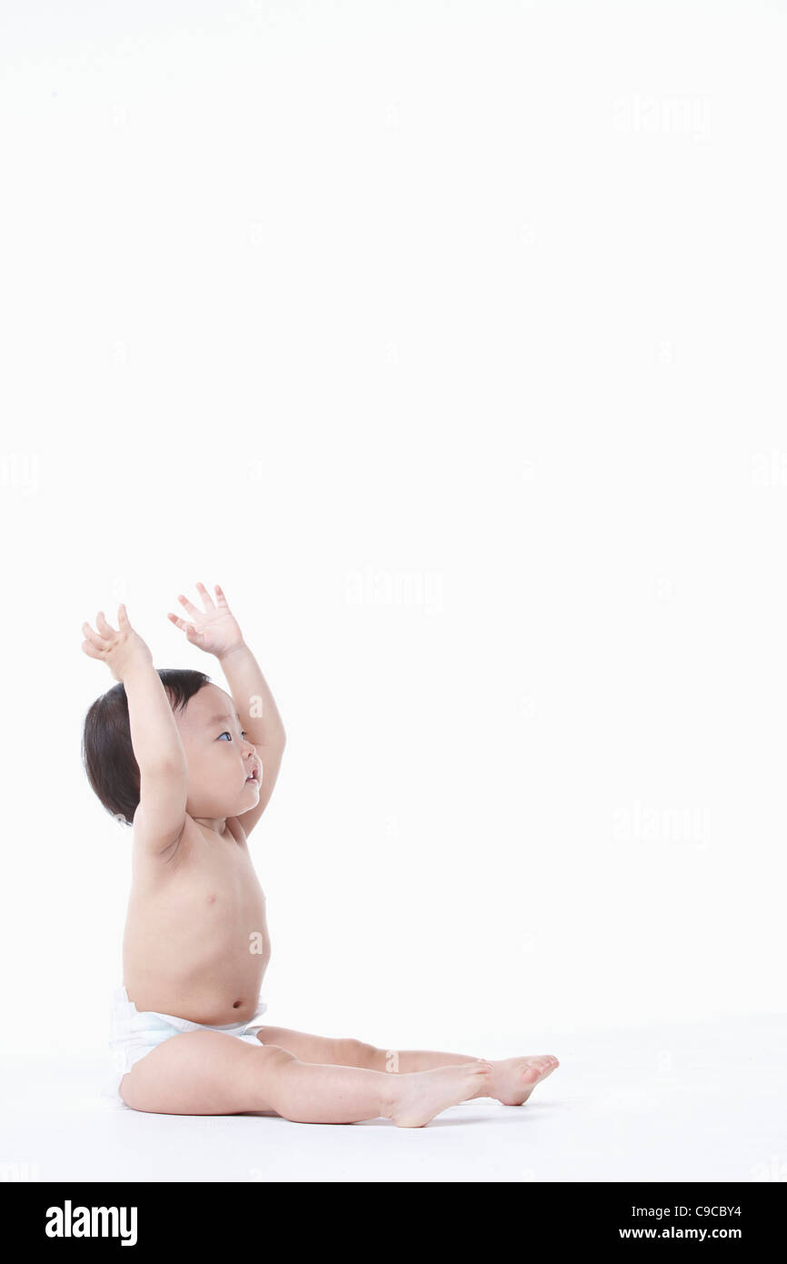 Baby boy nel pannolino Foto Stock