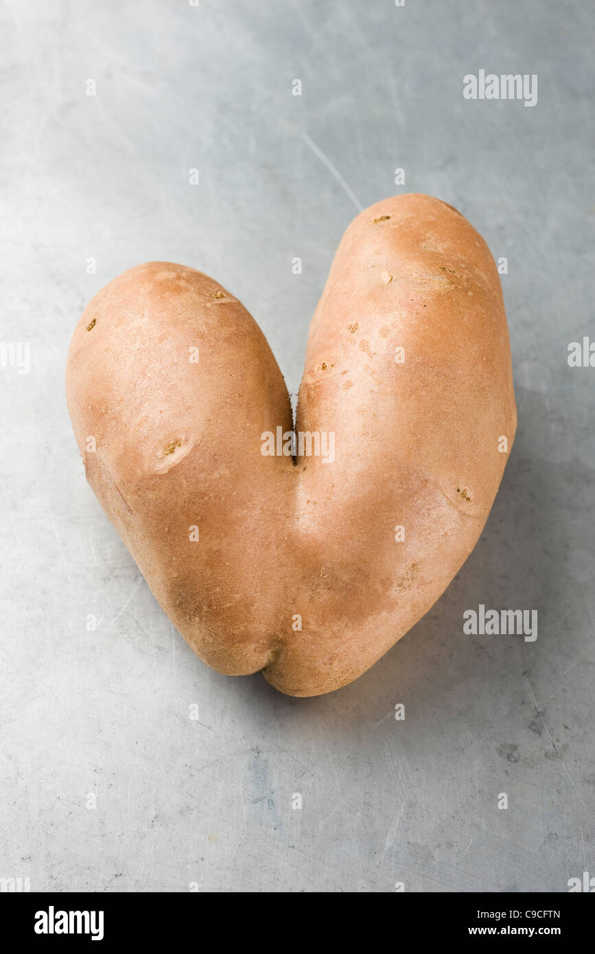 A forma di cuore la patata Foto Stock