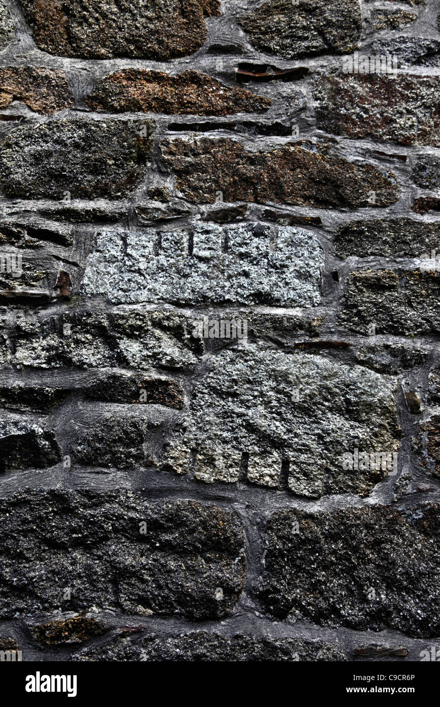 I blocchi di granito che mostra segni di utensile di estrazione nella parete della mia casa del motore , nei pressi di tirapiedi , Bodmin Moor , Cornovaglia , Inghilterra Foto Stock
